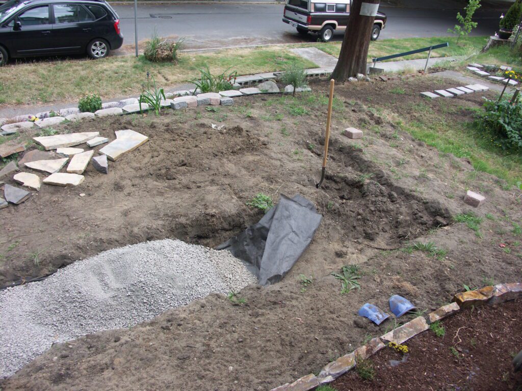 Spreading more gravel for front yard patio